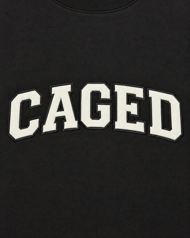 Caged Sweater Varsity – Black