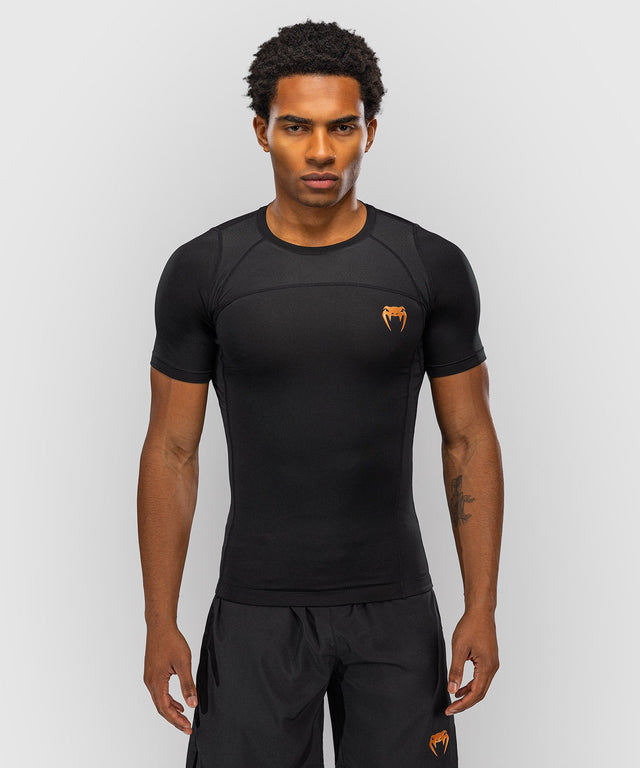 Rashguard Venum G-Fit Revolution Manga Corta – Negro/Cobre