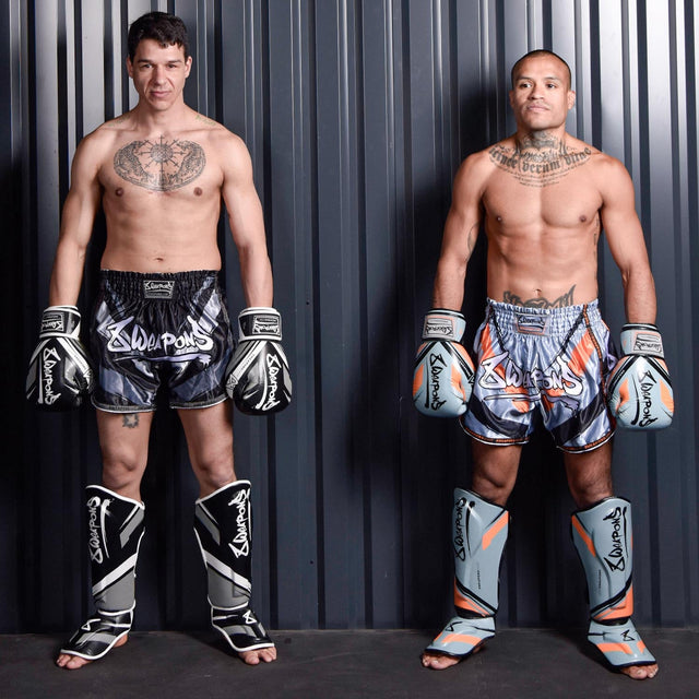 8 WEAPONS Muay Thai Shorts Shift – Ice Grey/Orange
