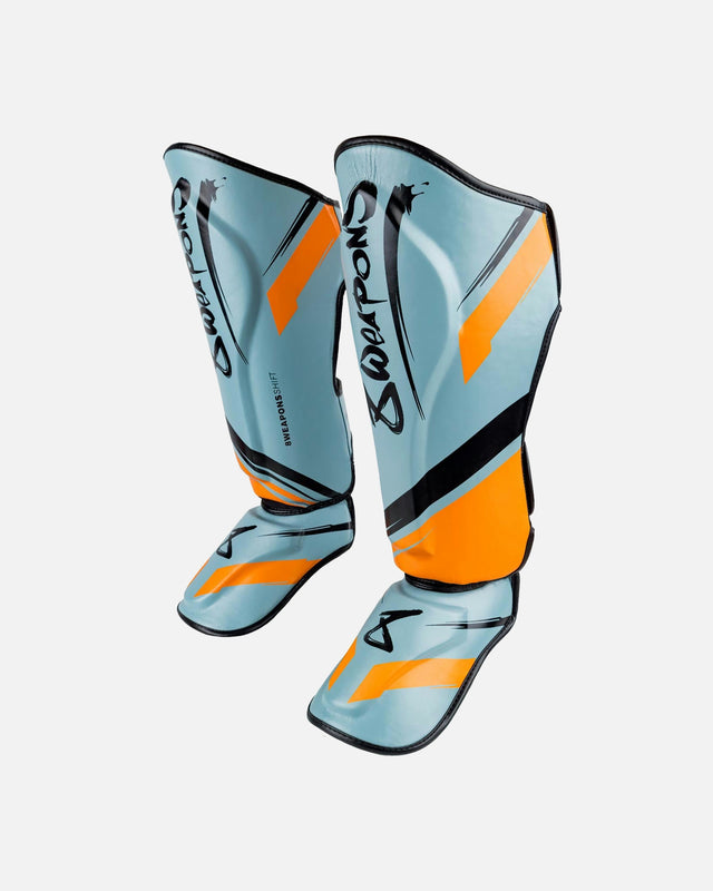 8 WEAPONS Shin guards Shift – Ice Grey/Orange