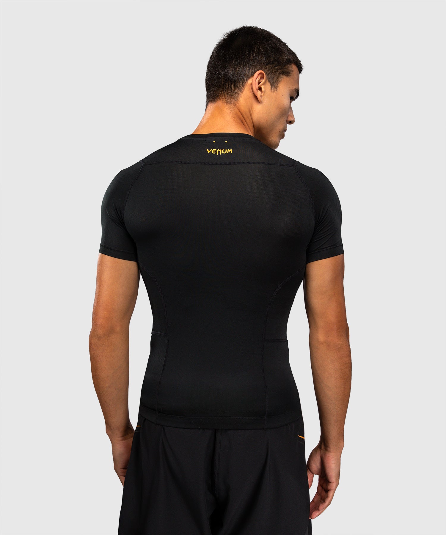 Venum Rashguard G-Core Korte Mouwen - Zwart/Goud