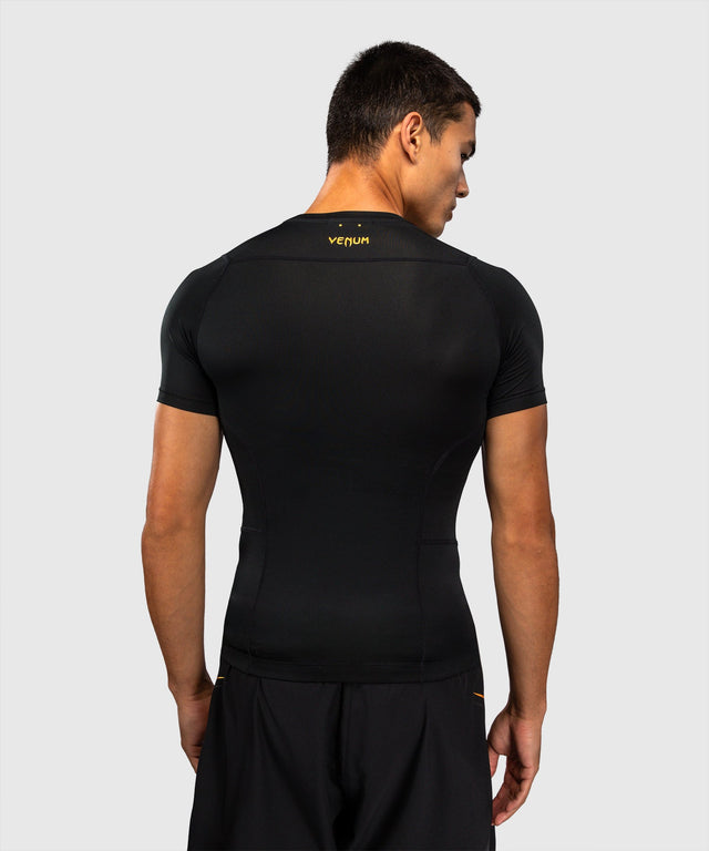 Venum Rashguard G-Core Korte Mouwen - Zwart/Goud