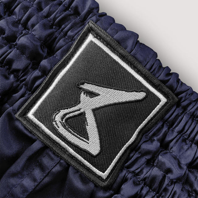 8 WEAPONS Muay Thai Shorts Mongkol – Navy/White