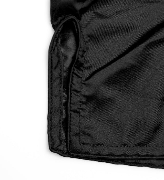 Caged Muay Thai shorts Classic – sort/hvid kvinde