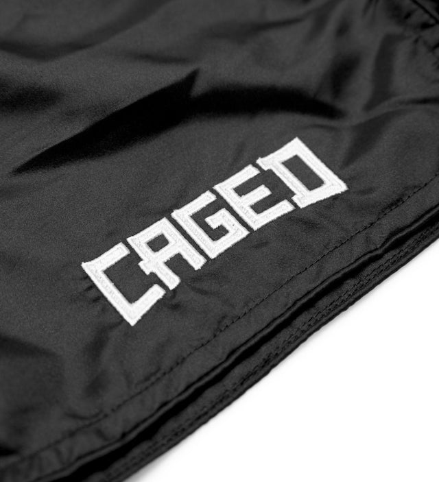 Caged Muay Thai shorts Classic – sort/hvid kvinde