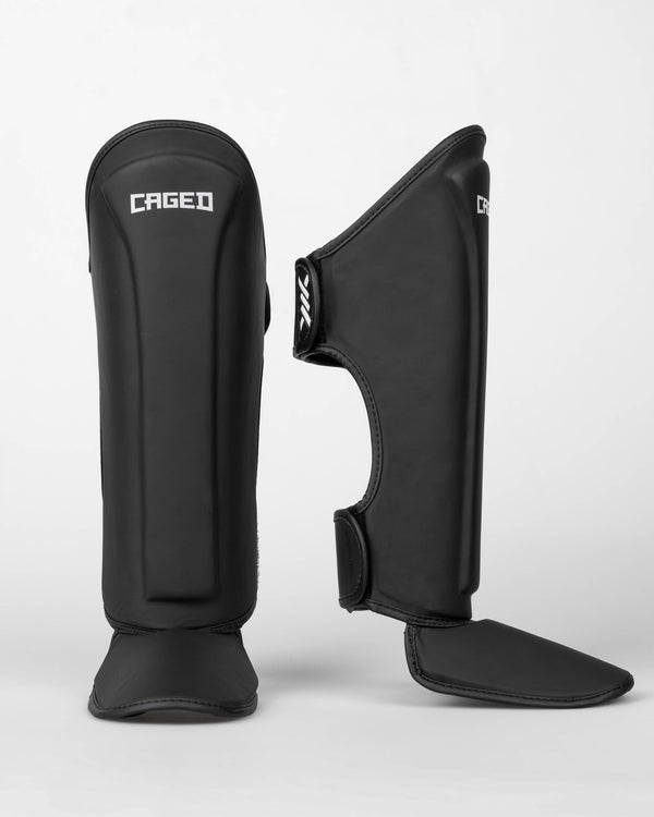 Caged Spark Kids Shin Guards – Matte Black/White