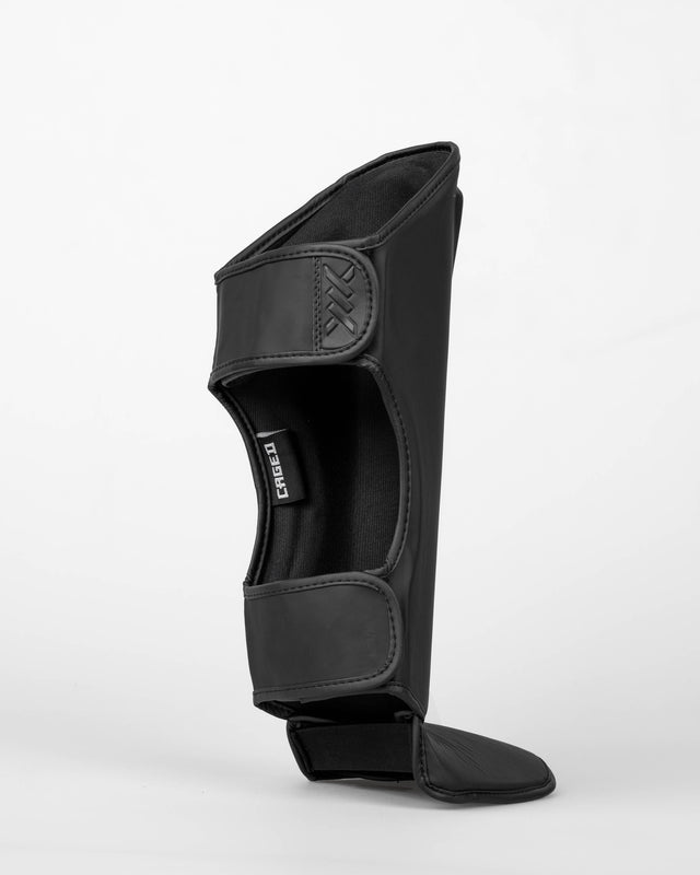 Caged Spark Kids Shin Guards – Matte Black