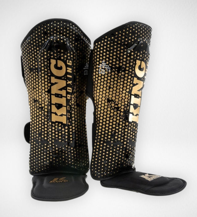 King Pro Boxing Shin guards Hexagon Kids – Black/Gold