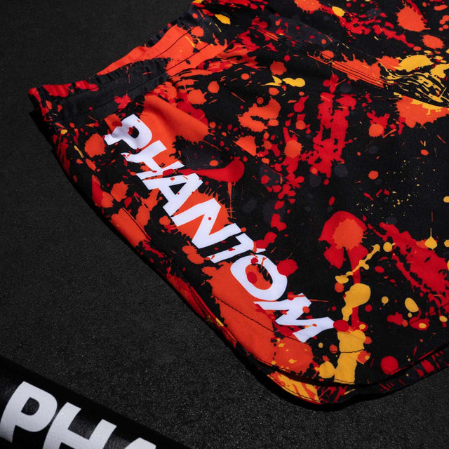 Phantom Athletics MMA Shorts Fusion Splatter – Red/Orange