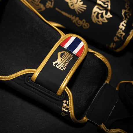 Ochraniacze na piszczele Phantom Athletics Muay Thai – Czarne/Złote