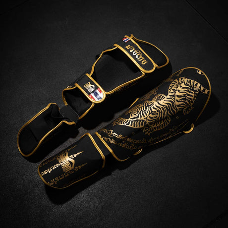 Ochraniacze na piszczele Phantom Athletics Muay Thai – Czarne/Złote