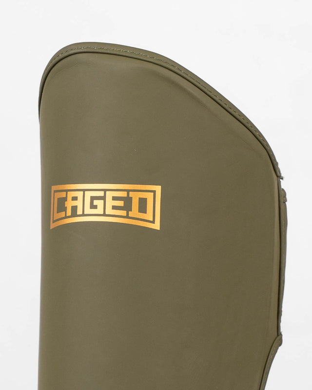 Caged Shadow Shin Guards - Khaki Green/Gold