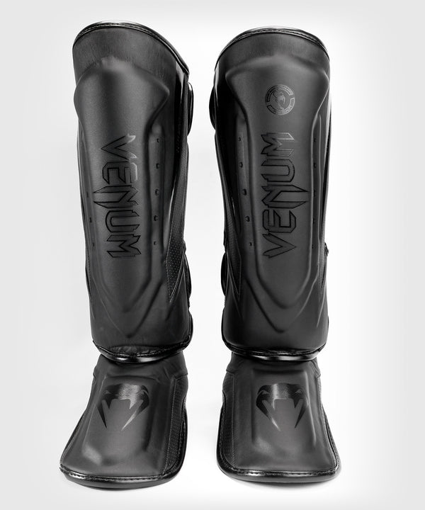 Venum Benskydd Kickboxning Elite Evo – Svart/Svart
