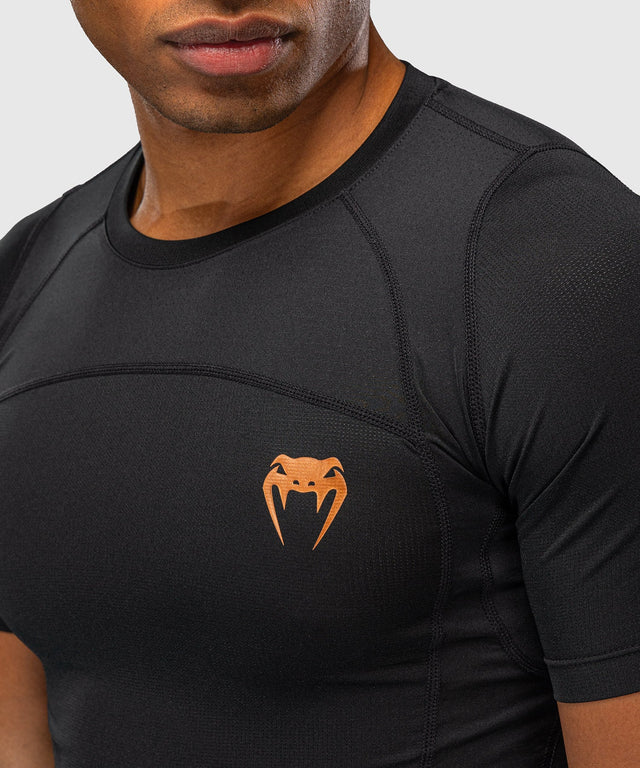 Rashguard Venum G-Fit Revolution Manga Corta – Negro/Cobre