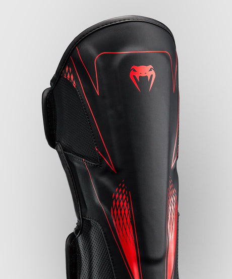 Venum Schienbeinschoner Amazonia Reborn – Schwarz/Rot