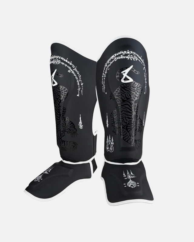 8 WEAPONS Shin guards Sak Yant Big Tiger – Black