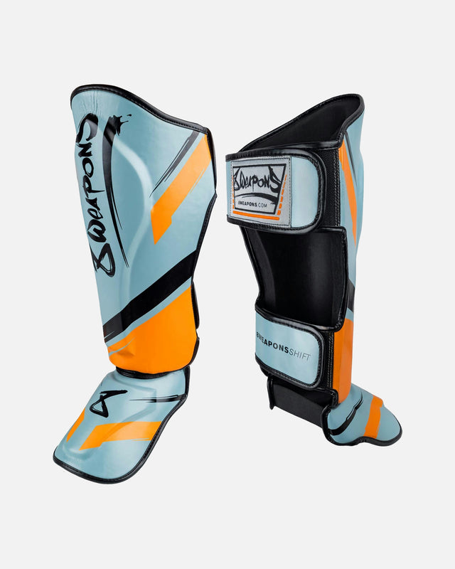 8 WEAPONS Shin guards Shift – Ice Grey/Orange